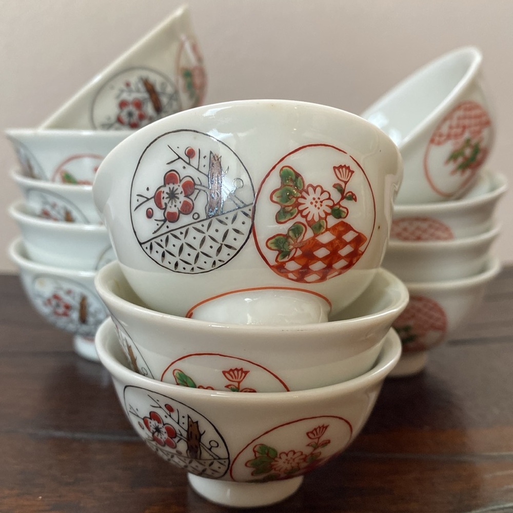 A Dozen Vintage Porcelain Sake Cups. Made in Japan.